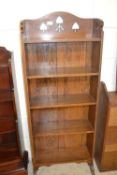 Early 20th Century oak bookcase cabinet with Arts & Crafts type decoration, 51cm wide