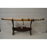 Samurai type sword with accompanying wooden stand, sword 87cm long