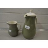 Wedgwood moss green hot water jug and a further smaller jug