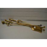 Set of three brass fire tools