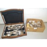 A case of assorted cutlery together with a box of various loose cutlery