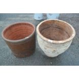 Two large terracotta plant pots, largest 43cm diameter