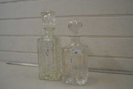 Two clear glass spirit decanters