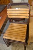 Set of four Cox metal framed and slatted wood stacking chairs