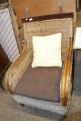 Modern bamboo framed and woven covered armchair