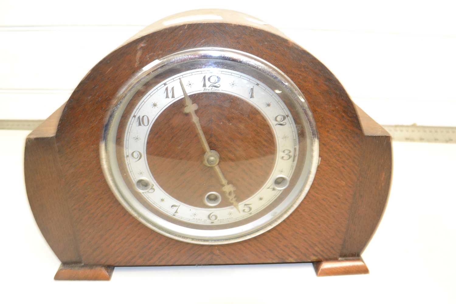 Oak cased dome topped mantel clock