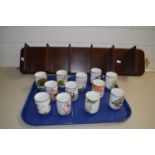 Collection of Franklin porcelain, Japanese small vases or cups together with accompanying shelf