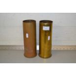 Pair of brass shell cases, 23cm high