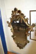 20th Century wall mirror in foliate gilt effect frame