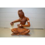 Far Eastern hardwood figure in seated position, 45cm high