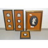Mixed Lot: Wedgwood Black Jasper ware wall plaques set in fabric mounted frames