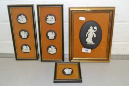 Mixed Lot: Wedgwood Black Jasper ware wall plaques set in fabric mounted frames