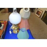 Two table lamps and various shades