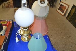 Two table lamps and various shades
