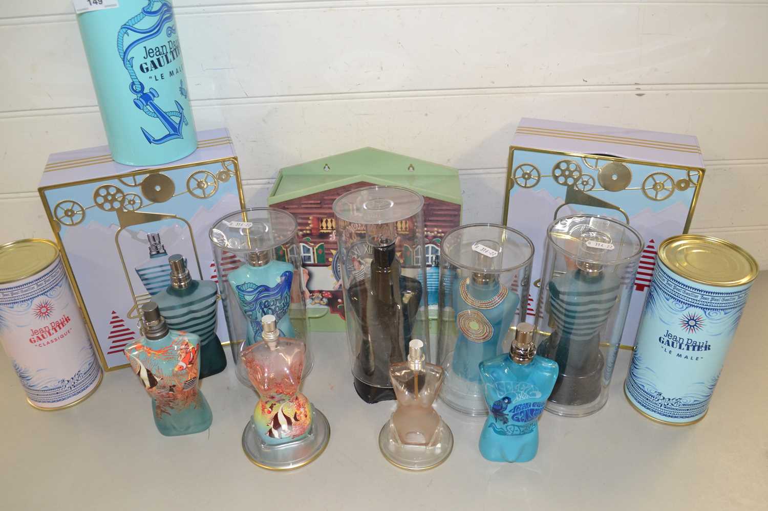 Collection of Jean Paul Gaultier perfume bottles (empty)