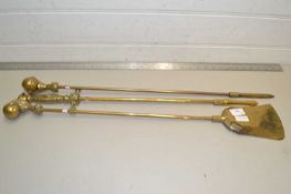 Three various brass fire tools