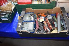 Quantity of assorted toy railway carriages, tracks and two controller units