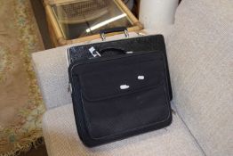 Hard plastic brief case and one other