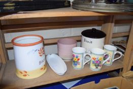 Two biscuit barrels, mugs and other ceramics