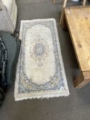 Small Chinese wool floor rug