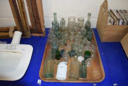Tray of various small vintage glass bottles