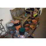 Mixed Lot: Terracotta pots and various plastic garden pots, seed trays etc