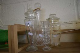 Glass decanter, two jars and covers and a vase