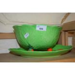 Cabbage leaf style bowl decorated with oranges and a matching oval dish