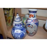 Chinese ginger jar together with a blue and white ginger jar and two others