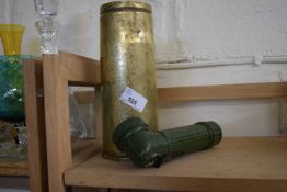 Brass shell casing and a torch