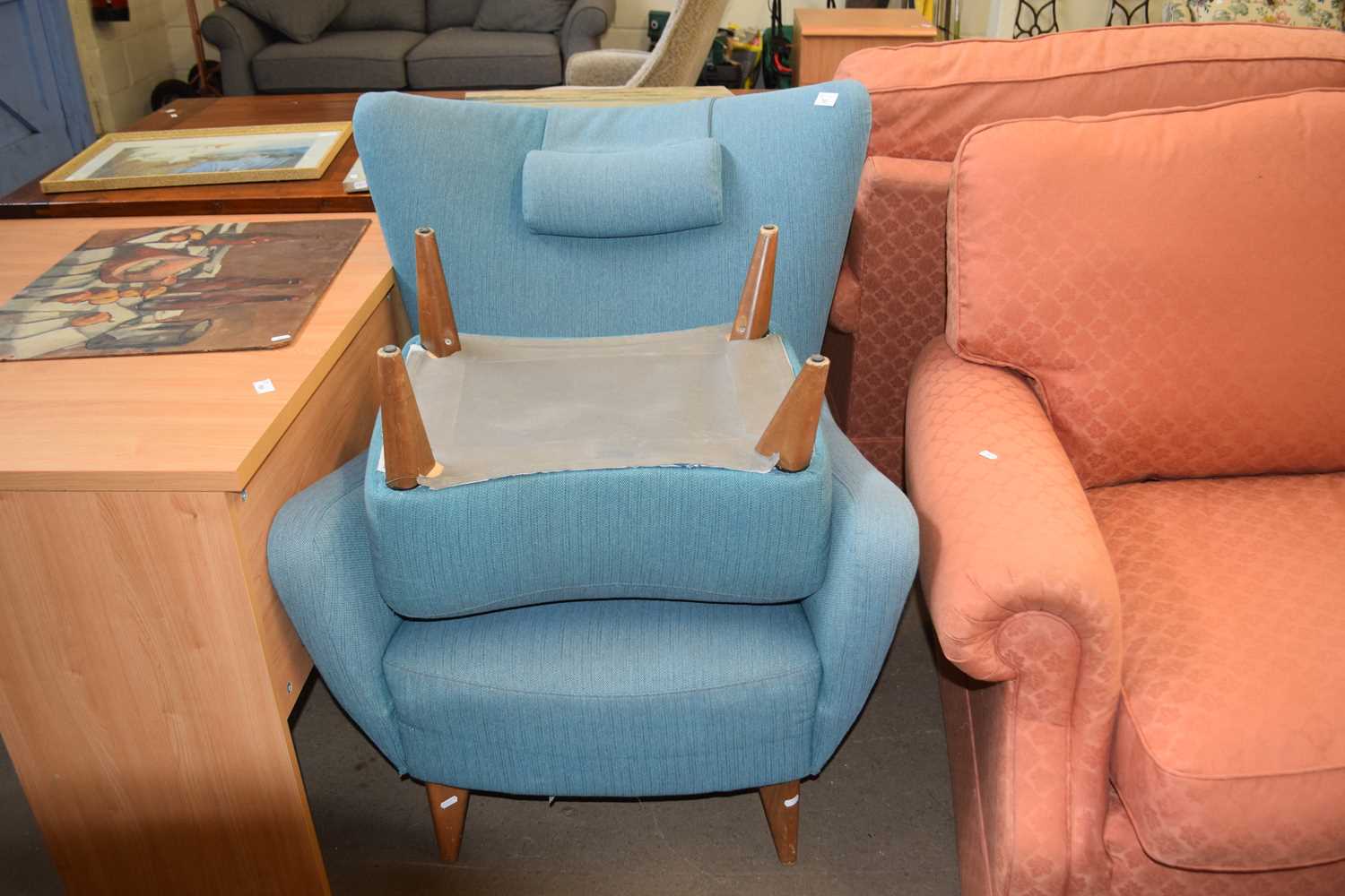 Retro style wing back armchair and accompanying stool