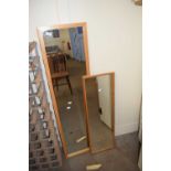 Two modern rectangular wall mirrors