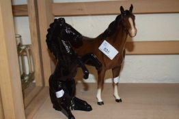 Royal Doulton horse and a model of a black horse rearing