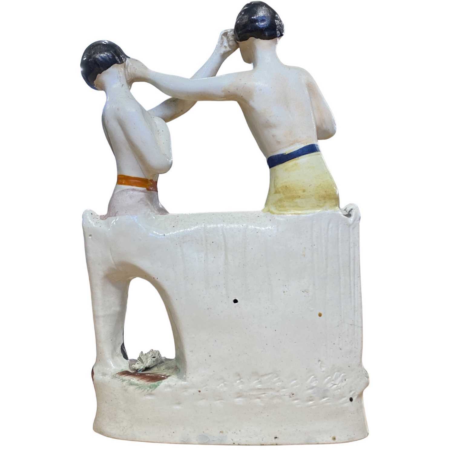 A Staffordshire figure of Heenan and Sayers, boxing group, mid/late 19th Century. The boxing match - Image 2 of 5
