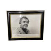 A framed 8x10" black and white photograph, bearing the signature of Star Wars' Owen Lars, Phil Brown