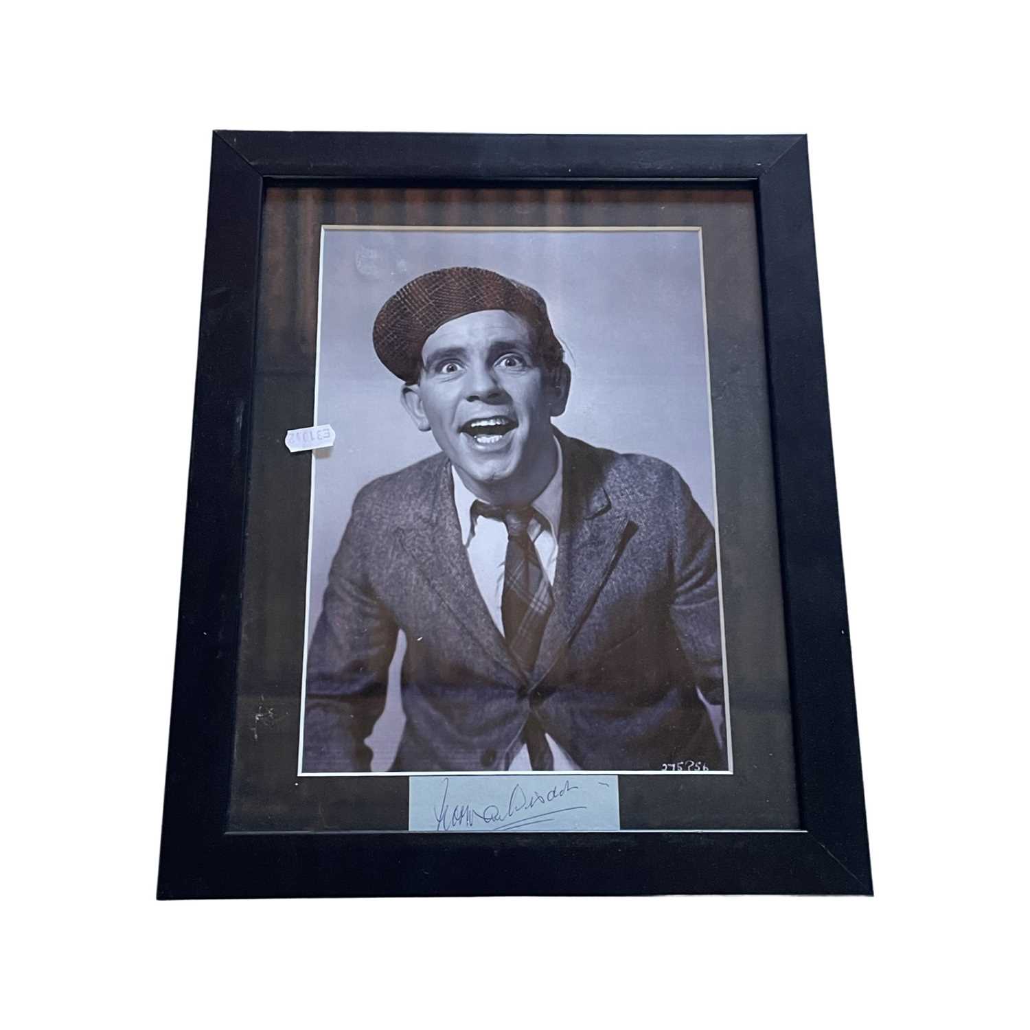 A presentation frame containing a black and white 8x10" photograph and sheet of blue paper bearing - Image 2 of 2