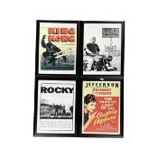 A set of 4 framed and glazed reproduction film posters, to include: - Breakfast at Tiffany's - Rocky