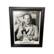 A framed 8x10" black and white photograph, bearing the signature of Dr Who, Pete Davison, in black