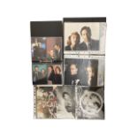 A mixed lot of postcards and 8x10" stills from popular 1990s/2000s teen TV shows, to include: -