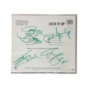 A KISS: Lick it Up 12" vinyl LP, bearing the signatures of Gene Simmons, Paul Stanley and Eric