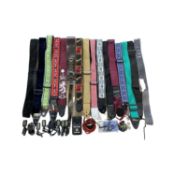 A quantity of various guitar accessories to include: - Guitar straps - Assorted plectrums - Clip