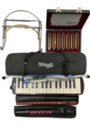 A mixted lot of various wind instruments, to include: - A cased Stagg Melodica with extra hose - A