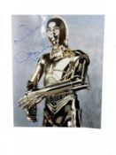An 8x10" colour photograph, bearing the signature of Star Wars' C-3PO, Anthony Daniels in blue