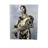 An 8x10" colour photograph, bearing the signature of Star Wars' C-3PO, Anthony Daniels in blue