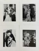 A fine collection of large 14x12" film stills depicting stars from the golden age of cinema, to