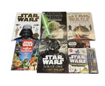 A mixed lot of various Star Wars books, guides and activity packs