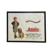 A large framed and glazed cinema poster for classic 1980s musical film Annie, starring Tim Curry,