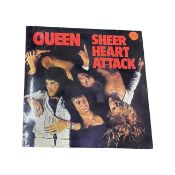 A Queen 'Sheer Heart Attack' 12" vinyl LP (EMC 3061)