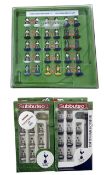 A plastic display case containing Subbuteo team players of Tottenham Hotspur F.C, from 1967 -