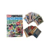 A quantity of 1970s Topps Chewing Gum collectable football cards, together with a vintage Football